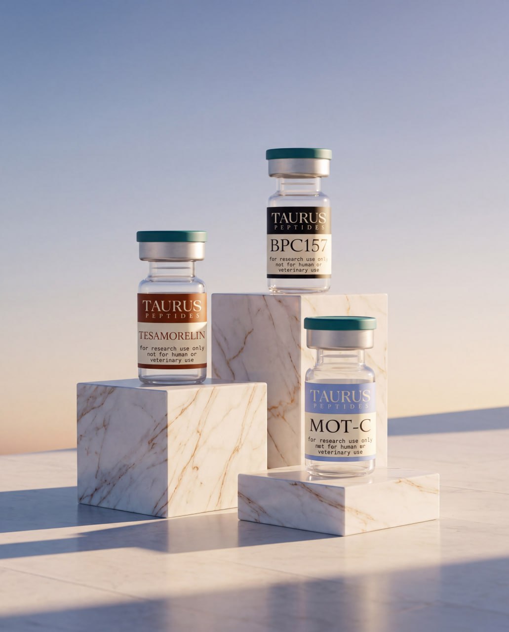 Three Taurus Peptides vials on marble blocks